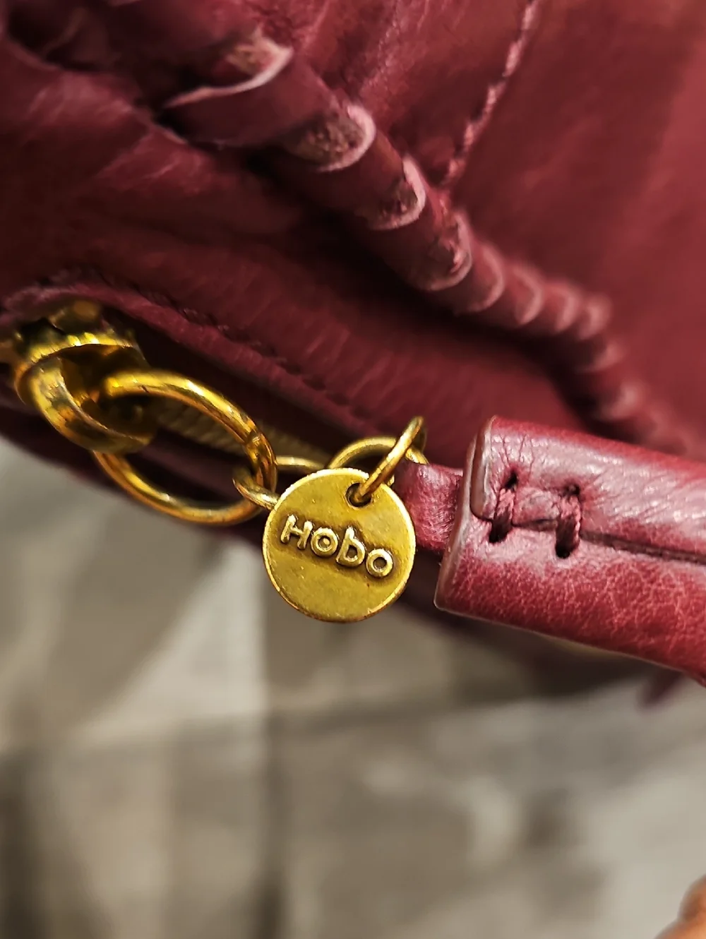 HOBO Burgundy Leather Shoulder Bag w/ Whipstitching & Tassel (Medium/Large Size)